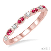 1.35 MM Ruby and 1/6 Ctw Round Cut Diamond Precious Stone Wedding Band in 14K Rose Gold