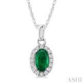 5x3 MM Oval Shape Emerald and 1/20 Ctw Round Cut Diamond Halo Precious Pendant with Chain in 10K White Gold
