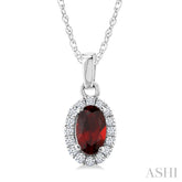 5x3 MM Oval Shape Garnet and 1/20 Ctw Round Cut Diamond Halo Semi-Precious Pendant with Chain in 14K White Gold