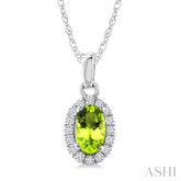5x3 MM Oval Shape Peridot and 1/20 Ctw Round Cut Diamond Halo Semi-Precious Pendant with Chain in 10K White Gold