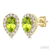 5x3 MM Pear Shape Peridot and 1/8 Ctw Single Cut Diamond Halo Semi-Precious Stud Earrings in 10K Yellow Gold