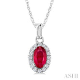 5x3 MM Oval Shape Ruby and 1/20 Ctw Round Cut Diamond Halo Precious Pendant with Chain in 10K White Gold