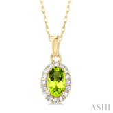 5x3 MM Oval Shape Peridot and 1/20 Ctw Single Cut Diamond Halo Semi-Precious Pendant with Chain in 14K Yellow Gold