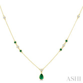 6X4 MM & 2 MM Pear and Round Shape Emerald and 1/6 Ctw Round Cut Diamond Drop Necklace in 14K Yellow Gold