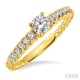 1/2 Ctw Diamond Engagement Ring with 1/4 Ct Round Cut Center Stone in 14K Yellow Gold