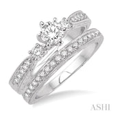 3/4 ctw Diamond Wedding Set with 5/8 ctw Round Cut Engagement Ring and 1/5 ctw Wedding Band in 14K White Gold