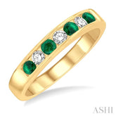 2.5 MM Round Cut Emerald and 1/5 Ctw Channel Set Round Cut Diamond Band in 14K Yellow Gold