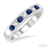 2.5 MM Round Cut Sapphire and 1/5 Ctw Channel Set Round Cut Diamond Band in 14K White Gold