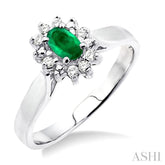 5x3mm Oval Cut Emerald and 1/10 Ctw Round Cut Diamond Ring in 10K White Gold