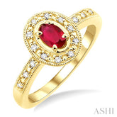 5x3 MM oval cut Ruby and 1/10 Ctw Round Cut Diamond Ring in 14K Yellow Gold.