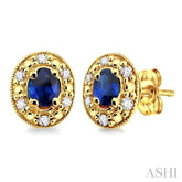 4x3 MM Oval Shaped Sapphire and 1/10 Ctw Single Cut Diamond Earrings in 10K Yellow Gold