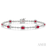 5x3 MM Oval Cut Ruby and 1/20 Ctw Round Cut Diamond Bracelet in 10K White Gold