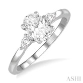 3/4 Ctw Pear and Oval Cut Diamond Ladies Engagement Ring With 1/2 Ct Oval Cut Center Stone in 14K White Gold