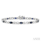 5x3 MM Oval Cut Sapphire and 1/10 Ctw Single Cut Diamond Bracelet in 10K White Gold