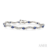 4x3 MM Oval Cut Sapphire and 1/10 Ctw Round Cut Diamond Bracelet in 14K White Gold
