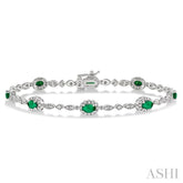 5x3 MM Oval Cut Emerald and 1/20 Ctw Round Cut Diamond Bracelet in 14K White Gold