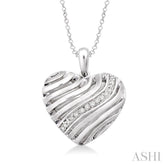 1/10 Ctw Heart Shape Round Cut Diamond Puff Pendant in Sterling Silver with Chain