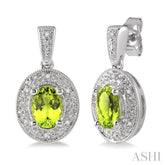 7x5 MM Oval Cut Peridot and 1/20 Ctw Round Cut Diamond Earrings in Sterling Silver