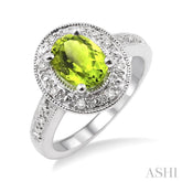 8x6 MM Oval Cut Peridot and 1/20 Ctw Round Cut Diamond Ring in Sterling Silver