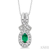 5x3 MM Oval Cut Emerald and 1/50 Ctw Round Cut Diamond Pendant in Sterling Silver with Chain