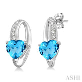 7x7 MM Heart Shape Blue Topaz and 1/20 Ctw Round Cut Diamond Earrings in Sterling Silver