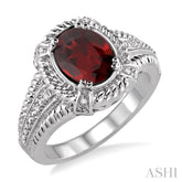 9x7 MM Oval Cut Garnet and 1/50 Ctw Round Cut Diamond Ring in Sterling Silver