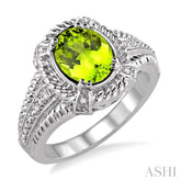 9x7 MM Oval Cut Peridot and 1/50 Ctw Round Cut Diamond Ring in Sterling Silver
