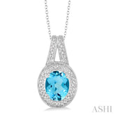 9x7 MM Oval Cut Blue Topaz a and 1/20 Ctw Round Cut Diamond Pendant in Sterling Silver with Chain
