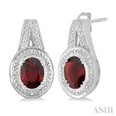 8x6 MM Oval Cut Garnet and 1/20 Ctw Round Cut Diamond Earrings in Sterling Silver