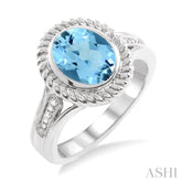 10x8 MM Oval Cut Blue Topaz and 1/20 Ctw Round Cut Diamond Ring in Sterling Silver