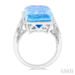 26x12 MM Emerald Cut Blue Topaz and 1/2 Ctw Round Cut Diamond Halo Semi-Precious Ring in 14K White Gold