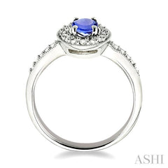 6x4mm Oval Cut Tanzanite and 1/4 Ctw Round Cut Diamond Ring in 14K White Gold