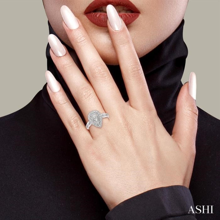 1/20 Ctw Pear Shape Round Cut Diamond Ring in Sterling Silver