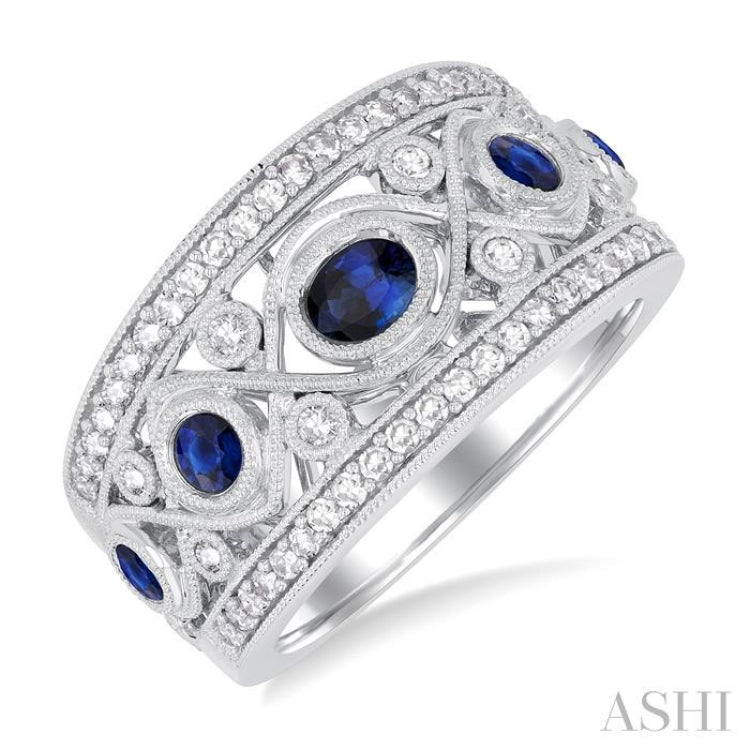 4x3 MM Oval, 2.8 MM and 2.4 MM Round Cut Sapphire and 3/8 Ctw Criss-Cross Framework Single Cut Diamond Precious Band in 14K White Gold