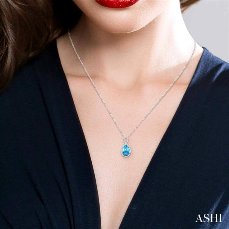 12x8 MM Entwined Pear Cut Blue Topaz and 1/4 Ctw Round Cut Diamond Semi-Precious Pendant in 10K White Gold with chain