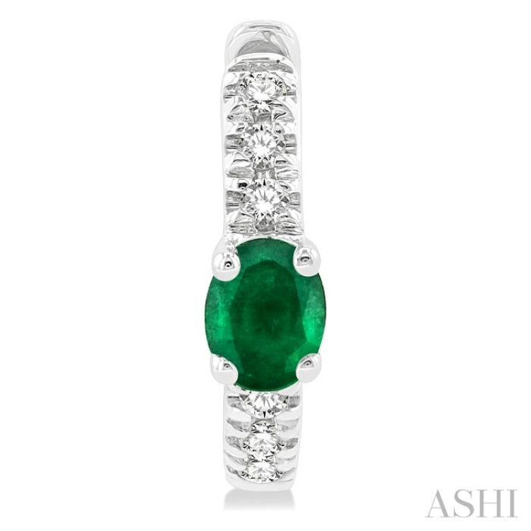 4X3 MM Oval Cut Emerald and 1/10 Ctw Petite Round Cut Diamond Fashion Huggies in 10K White Gold