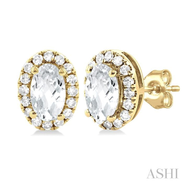 5x3 MM Oval Shape White Topaz and 1/8 Ctw Single Cut Diamond Halo Semi-Precious Stud Earrings in 10K Yellow Gold