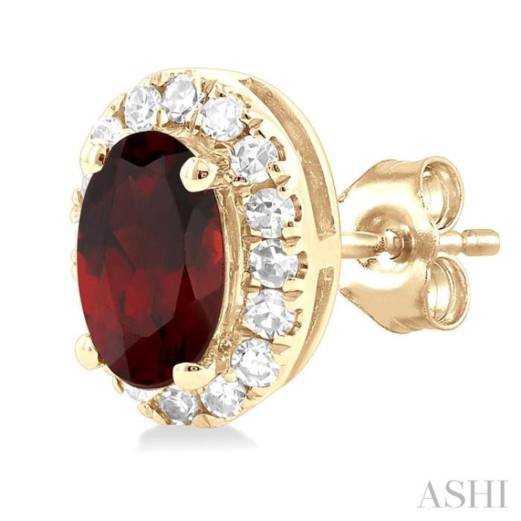 5x3 MM Oval Shape Garnet and 1/8 Ctw Round Cut Diamond Halo Semi-Precious Stud Earrings in 14K Yellow Gold