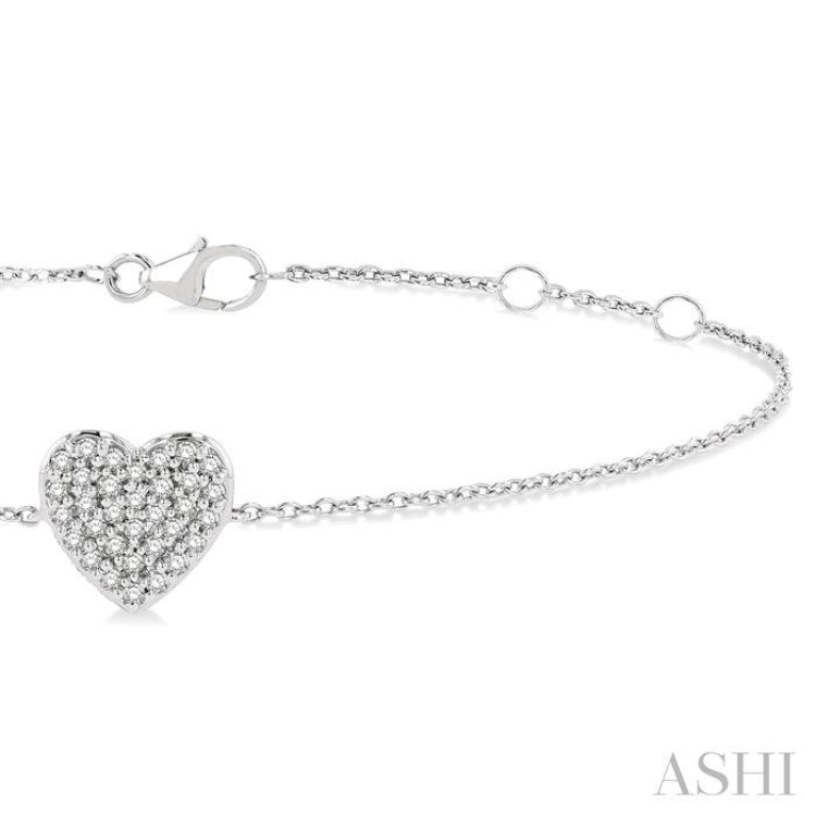 1/8 Ctw Petite Heart Round Cut Diamond Fashion Bracelet in 10K White Gold