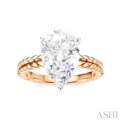1/10 Ctw Pear Shape Round Cut Diamond Semi-Mount Engagement Ring in 14K Rose and White Gold