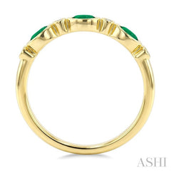 4X3 MM Oval Shape Emerald and 1/20 Ctw Bezel Set Round Cut Diamond Precious Fashion Band in 10K Yellow Gold