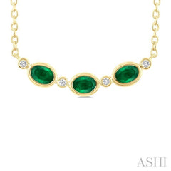4X3MM Oval Cut Emerald and 1/50 Ctw Bezel Set Round Cut Diamond Precious Fashion Necklace in 10K Yellow Gold