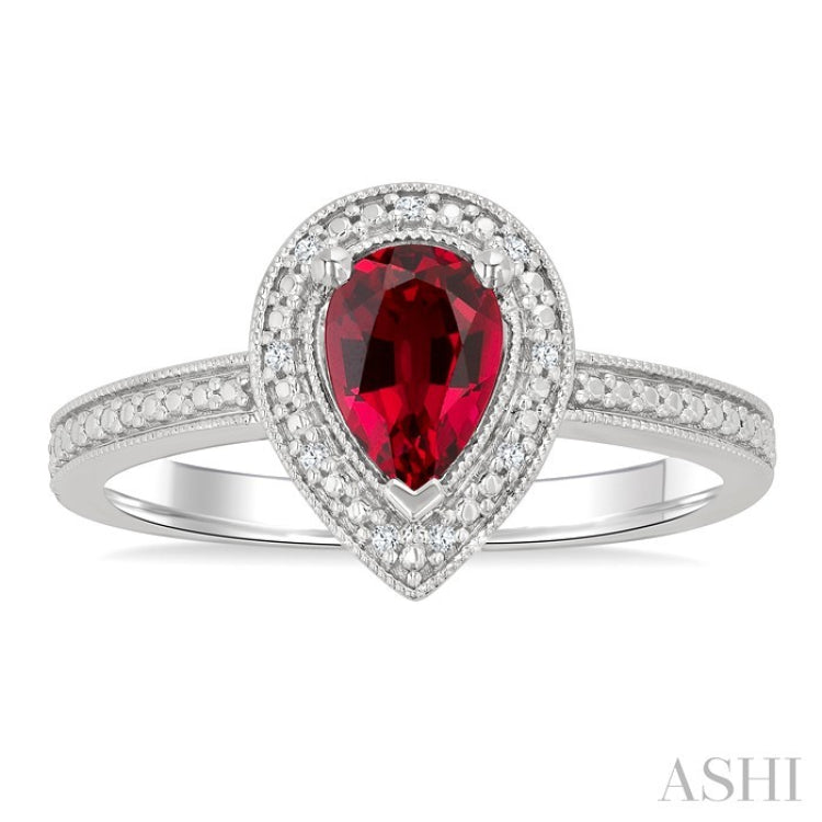 7X5 MM Pear Shape Lab-Created Ruby and 1/50 Ctw Round Cut Diamond Precious Ring in Sterling Silver