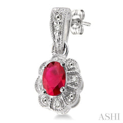 5x3 MM Oval Cut Ruby and 1/20 Ctw Round Cut Diamond Earrings in Sterling Silver