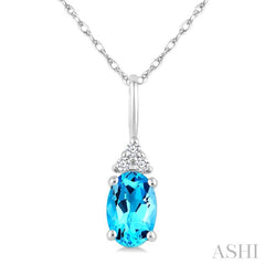 1/50 Ctw Oval Cut 6X4 MM Blue Topaz and Round Cut Diamond semi-precious Pendant With Chain in 10K White Gold