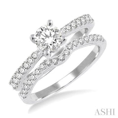 1 1/10 Ctw Diamond Wedding Set with 3/4 Ctw Round Cut Engagement Ring and 1/4 Ctw Wedding Band in 14K White Gold