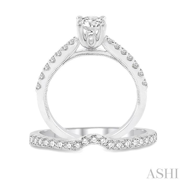 1 1/10 Ctw Diamond Wedding Set with 3/4 Ctw Round Cut Engagement Ring and 1/4 Ctw Wedding Band in 14K White Gold