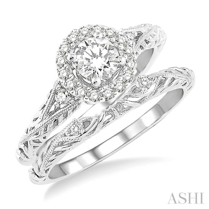 5/8 Ctw Diamond Wedding Set with 5/8 Ctw Round Cut Engagement Ring and 1/50 Ctw Wedding Band in 14K White Gold