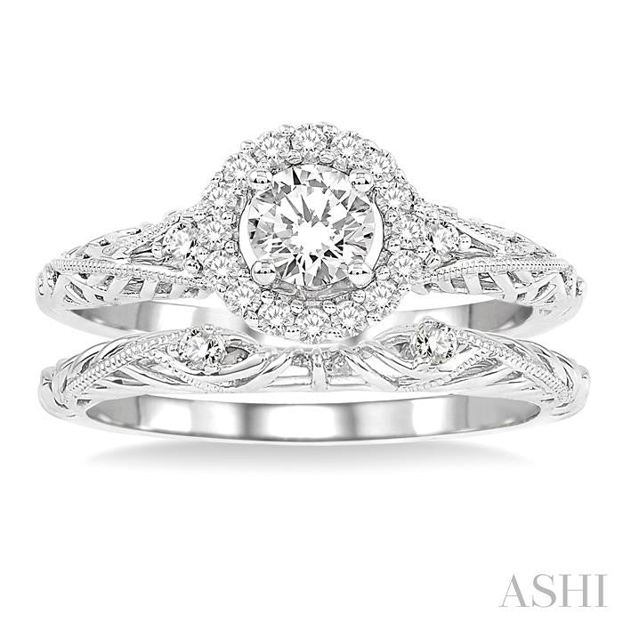 5/8 Ctw Diamond Wedding Set with 5/8 Ctw Round Cut Engagement Ring and 1/50 Ctw Wedding Band in 14K White Gold