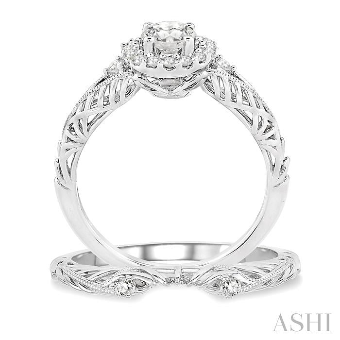 5/8 Ctw Diamond Wedding Set with 5/8 Ctw Round Cut Engagement Ring and 1/50 Ctw Wedding Band in 14K White Gold